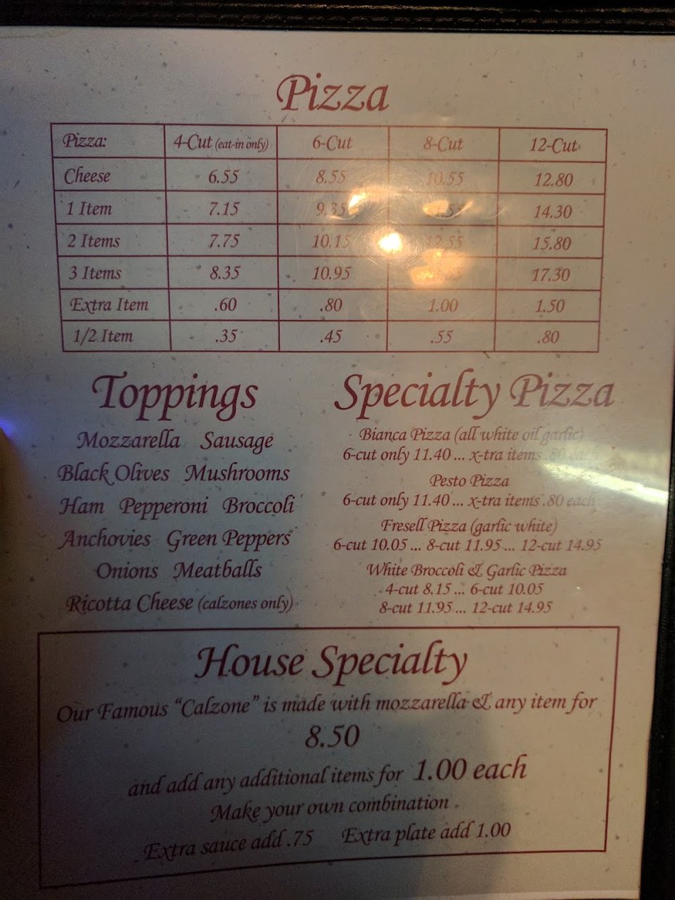 Menu page listing pasta, parmigiana, and wings.